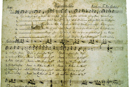 Ein altes Notenblatt des Weihnachtsliedes "Stille Nacht, heilige Nacht" - damals noch mit sechs Strophen.