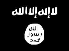 IS-Flagge mit dem ersten Teil der Schahada, dem Glaubensbekenntnis des Islam (fünf Säulen des Islam)