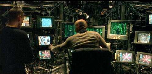 Szenenbild aus MATRIX: Neo (Keanu Reeves) wird in die Matrix eingeweiht