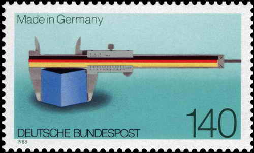 Sonderbriefmarke der Deutschen Bundespost von 1988 zu 100 Jahre "Made in Germany". Sie zeigt eine stilisierte Sechskantmutter, dessen Durchmesser von einem Messschieber in Schwarz-Rot-Gold gemessen wird.